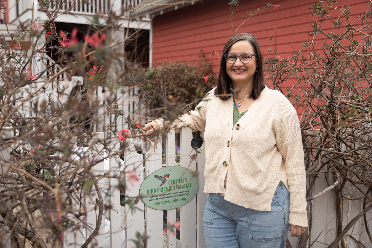 Jerilyn Maclean poses for a portrait in her backyard in Briar Chapel. Maclean is the founder of the Briar Chapel Native Plant Club, a neighborhood group with more than 500 members.